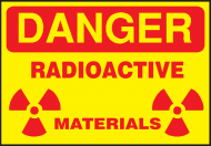 Maseczka ochronna z nadrukiem. Nadruk, grafika: „Niebezpieczeństwo Radioaktywne”.